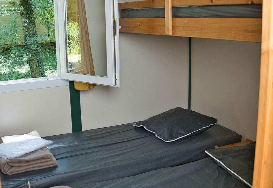 Bedroom in the holiday rental at our 4-star campsite, Le Chêne Vert, between Albi and Gaillac, Tarn.