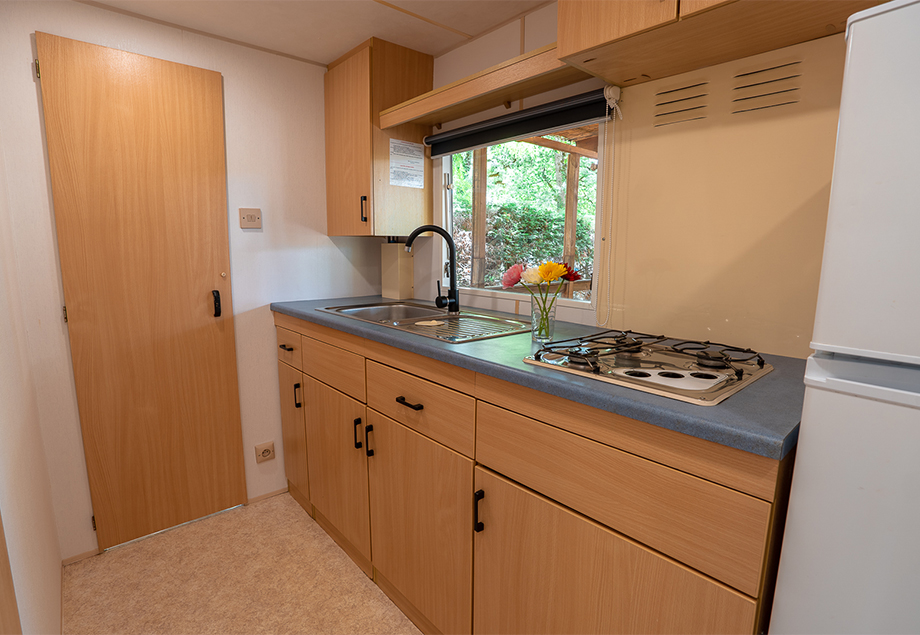 Interior of the mobile home for 10 people, at our 4-star campsite, Le Chêne Vert, in Castelnau-de-Montmiral, Tarn